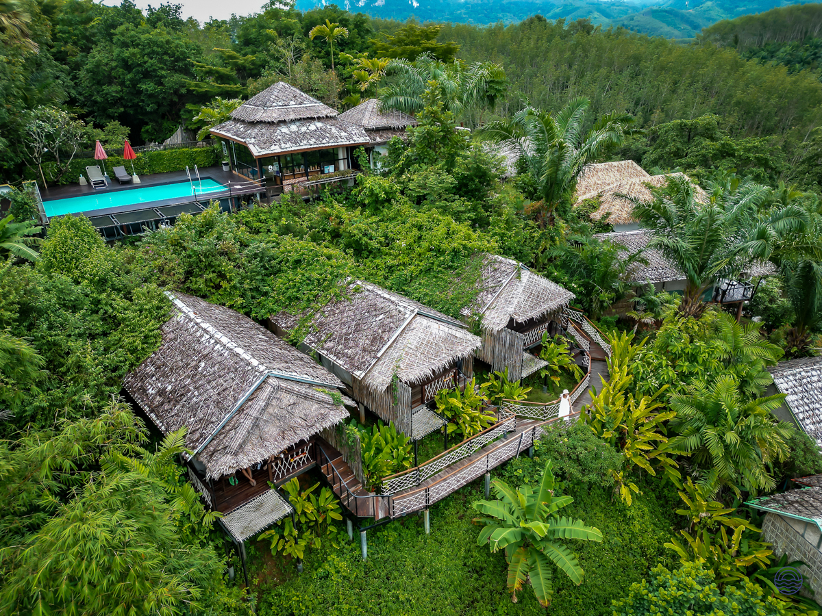 Relax in boutique bungalows surrounded by the vibrant green rainforest at a stunning Khao Sok retreat.