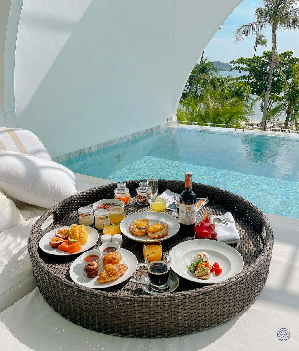 A lavish floating breakfast served in a private pool overlooking the beautiful beaches of Koh Samui.