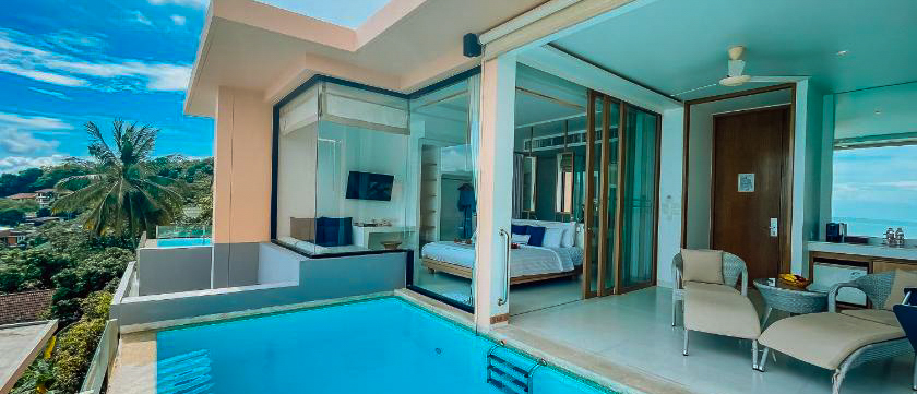 Luxurious hotel suite in Phuket with a private plunge pool and stunning ocean view.