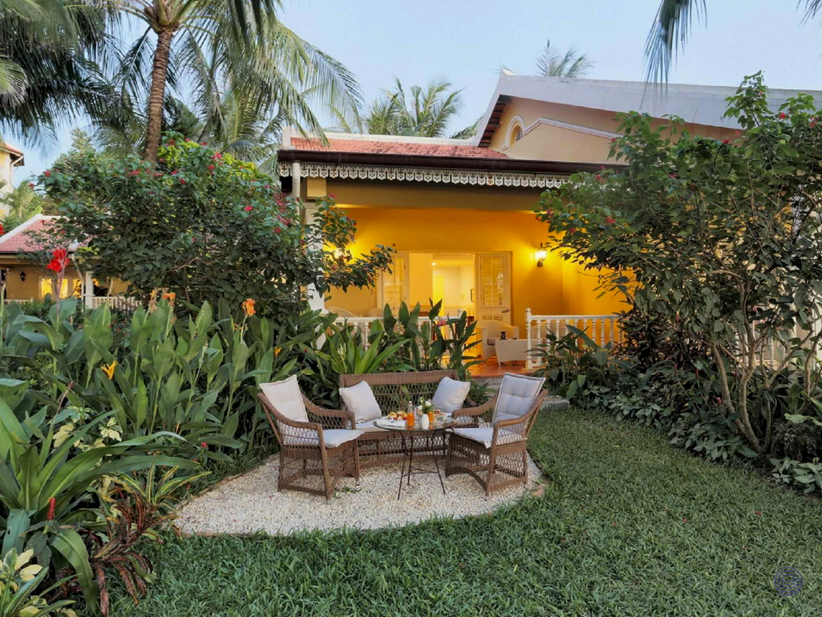 Enjoy a tranquil evening on the private patio of a charming resort villa in Phu Quoc.