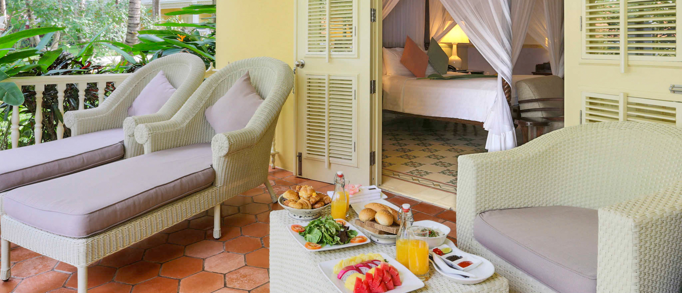 A relaxing breakfast spread on a private patio at a tropical resort in Phu Quoc.